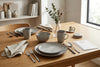 Gray Speckled Stoneware 16-Piece Dinnerware Set with Brown Rim and Silver Flatware
